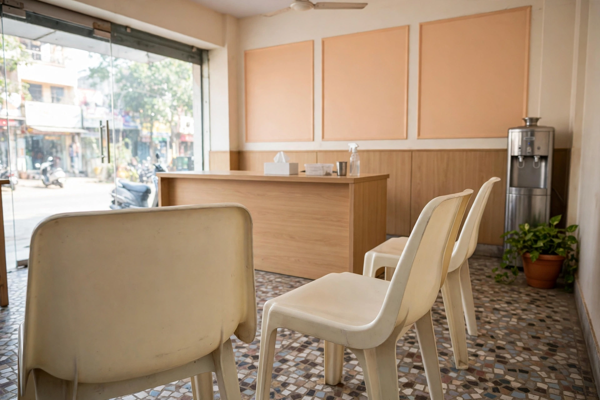 The waiting area at Dental Specialists — plastic chairs, the front desk and the glass front to Destination Center